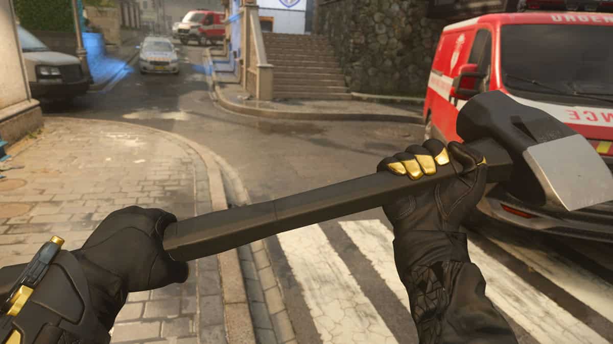 A player wields a sledgehammer in the game.