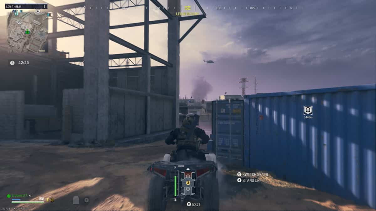 A video game screen shot of a soldier riding a quad bike, showcasing the thrilling action and excitement of the gameplay.