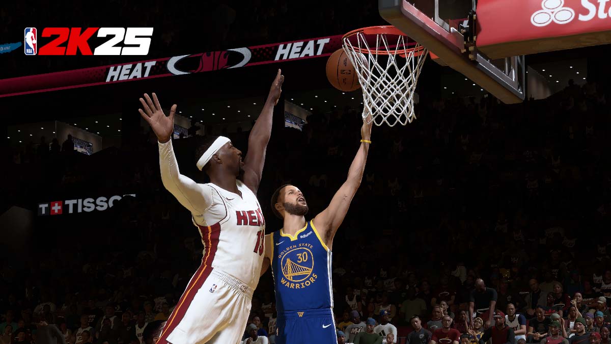 Steph Curry attempting a layup against Bam Adebayo in NBA 2K25