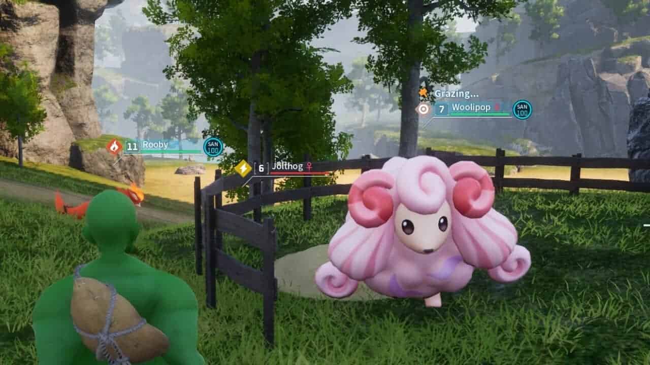 screengrab showing the pink sheep woolipop with a green character in palworld