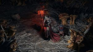 Image of the Warrior class with a flaming two-handed hammer and a bird pet in Path of Exile 2.