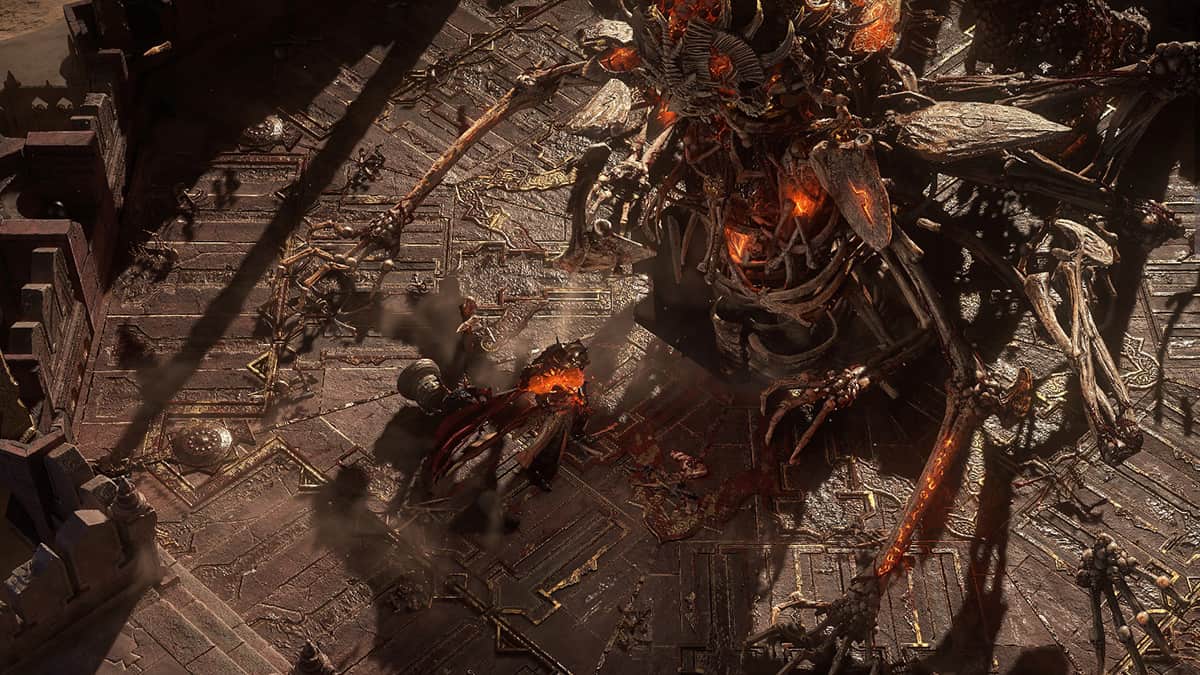 Image of the Warrior class player fighting against a bone-made boss enemy on top of a tower in Path of Exile 2.