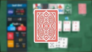 An image of a playing card on a table from the Balatro Plasma Deck.