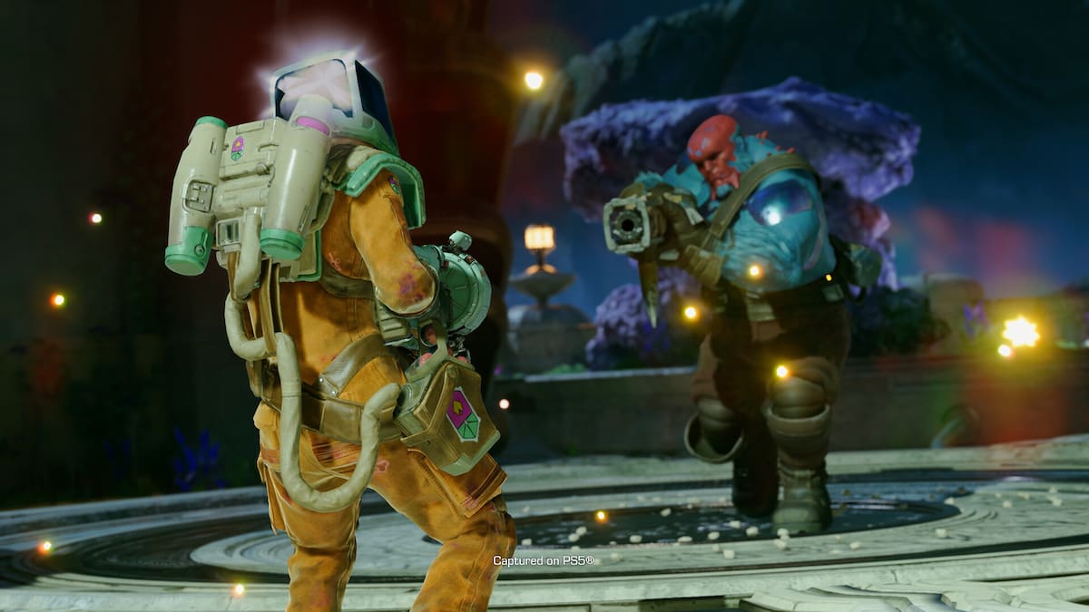 player in yellow hazmat suit facing a red face man in concord