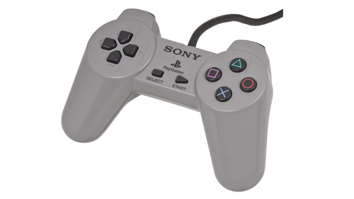 A Sony game controller, specifically the PlayStation Controller from 1994, on a white background.