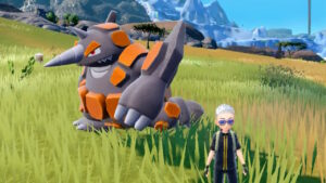 A Pokemon trainer standing next to their Rhyperior in the Indigo Disk DLC