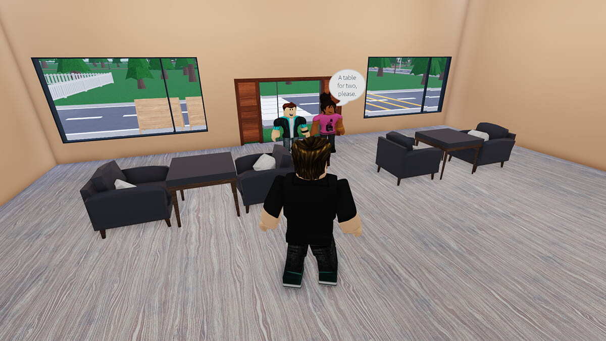 Restaurant Tycoon 2 player welcomes two guests into the restaurant.