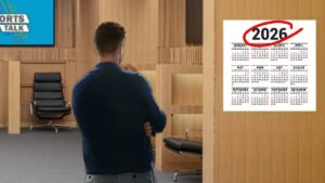 SI should just skip FM25: A man looking at a calendar showing 2026 in a dressing room.
