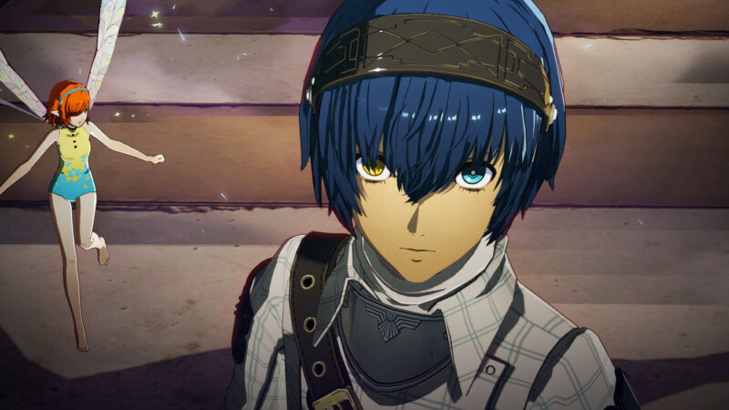 metaphor refantazio release date - a boy with blue hair and mismatched eyes looks at the camera