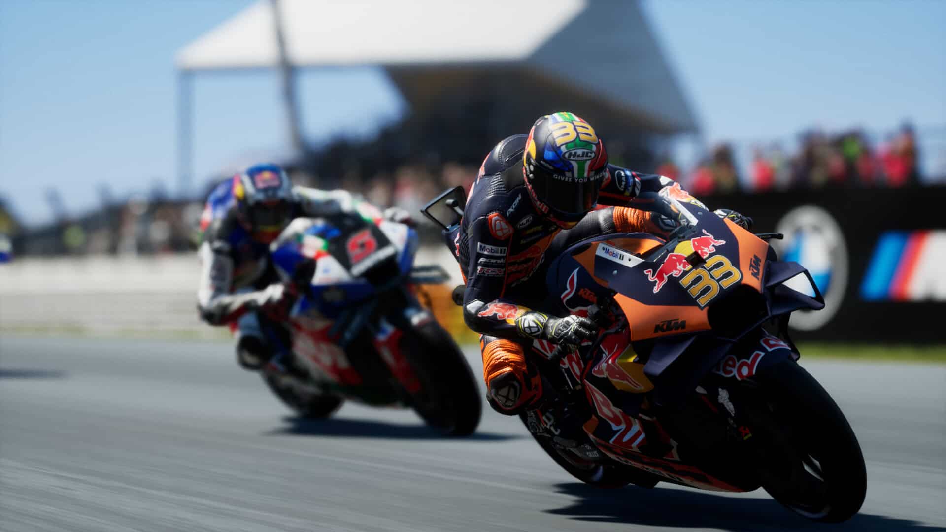 MotoGP 24 release date - Two MotoGP racers lean into a sharp turn on the track
