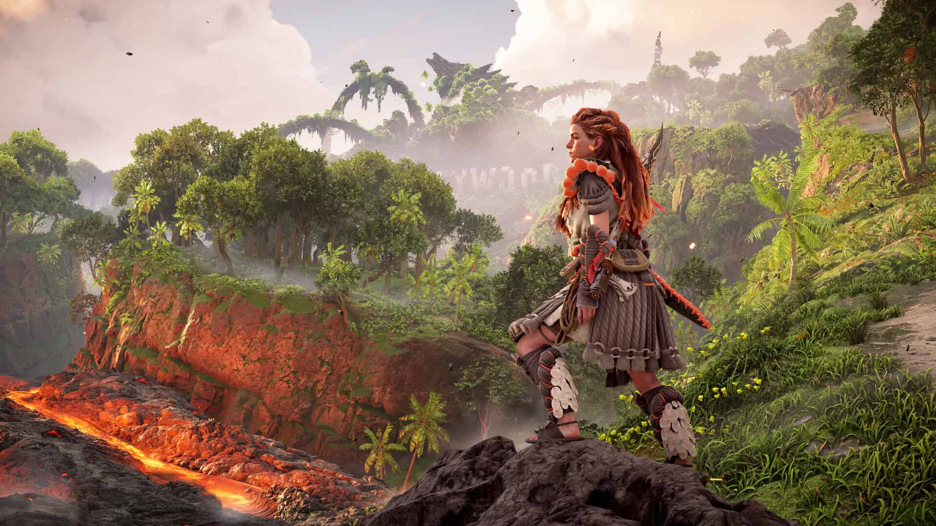 games like ghost of tsushima - a woman with red hair aims stands on a rock with greenery behind her.