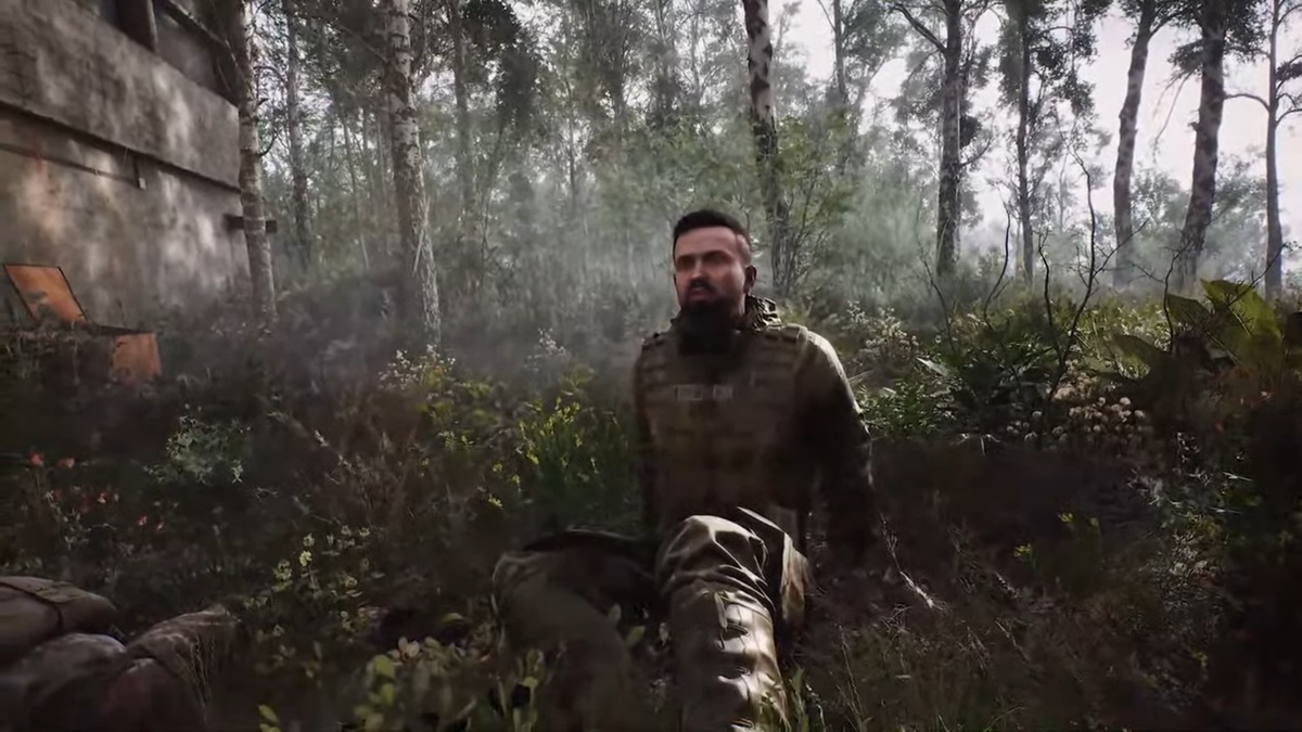 A character sits in a desolate forest.