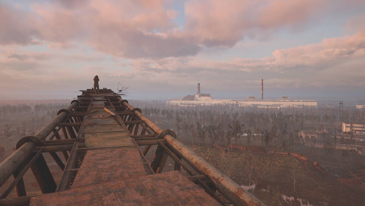 How to survive in Stalker 2 - 12 tips and tricks for beginners: Stalker overlooking Chornobyl.