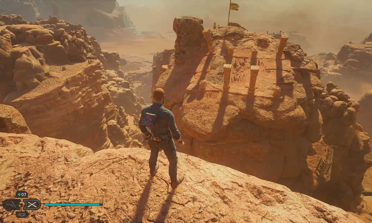 Star Wars Jedi Survivor Crypt of Uhrma: The solution in-game, with Cal looking off the edge of the cliff at the pillars in the desert.