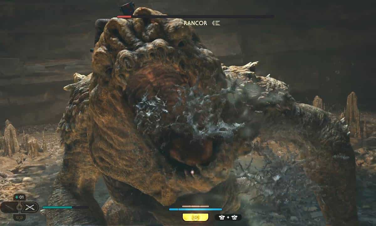 Star Wars Jedi Survivor Rancor boss: The execution animation as Cal plunges the lightsaber into the head of the Rancor.