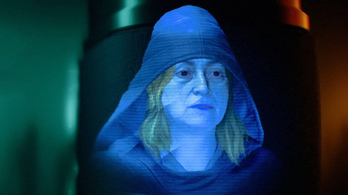Image of a holographic projection of Aila, an Expert in Star Wars Outlaws.