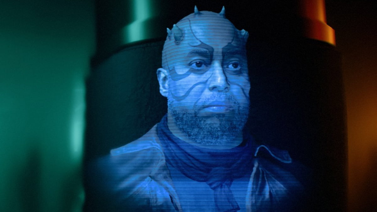 Image of a holographic projection of Bram, an Expert in Star Wars Outlaws.