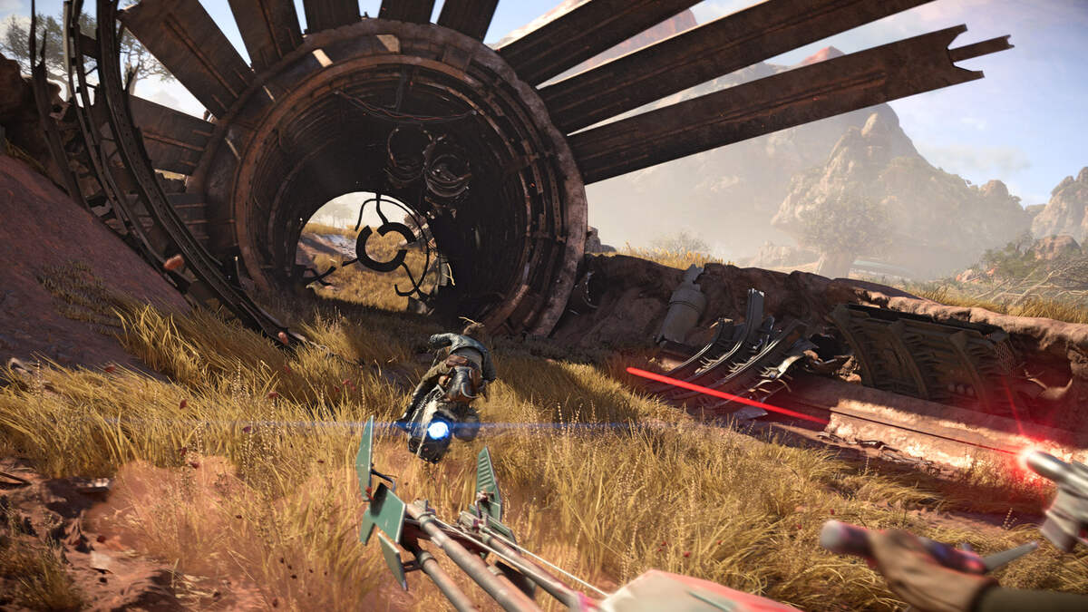 Star Wars Outlaws multiplayer: Kay riding a speeder through wreckage.
