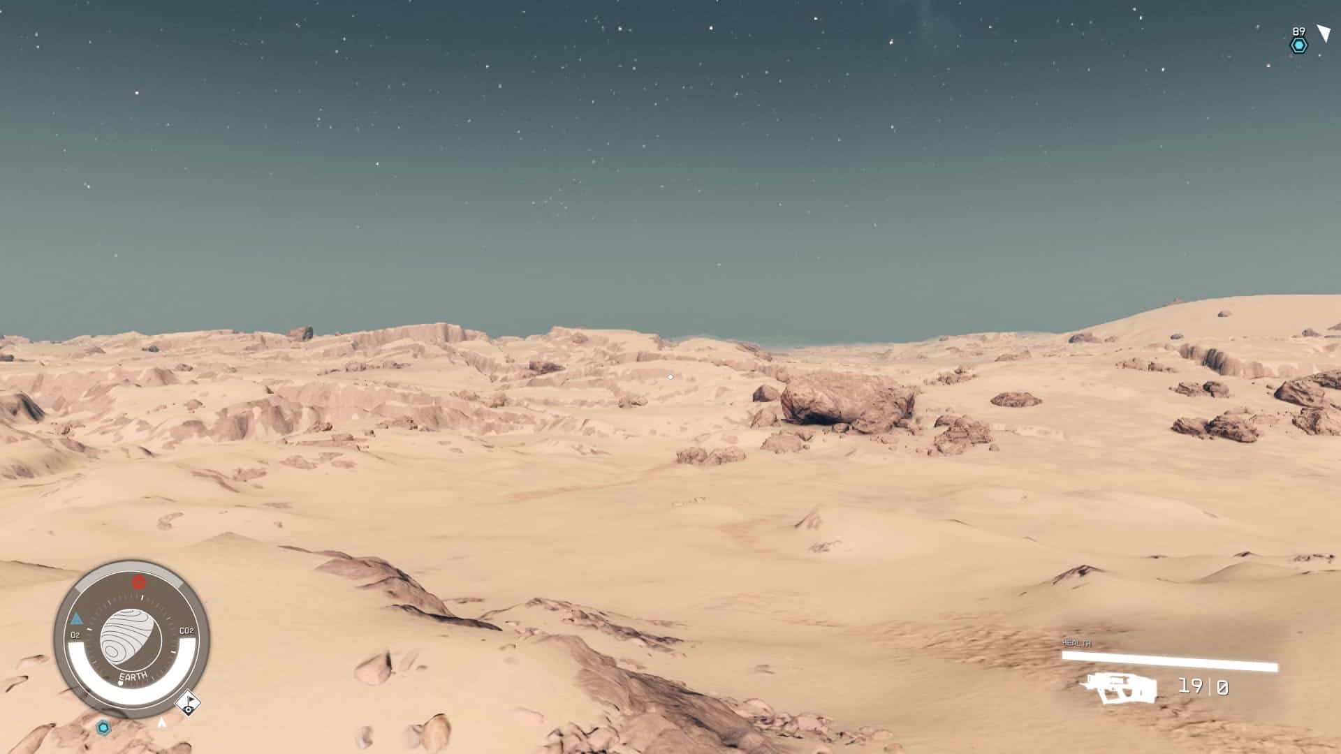 What happened to Earth in Starfield: The player looking across the desert of Earth.