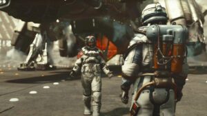 Starfield multiplayer or co-op: A player character and an NPC in a space suit talk outside of a parked starship.