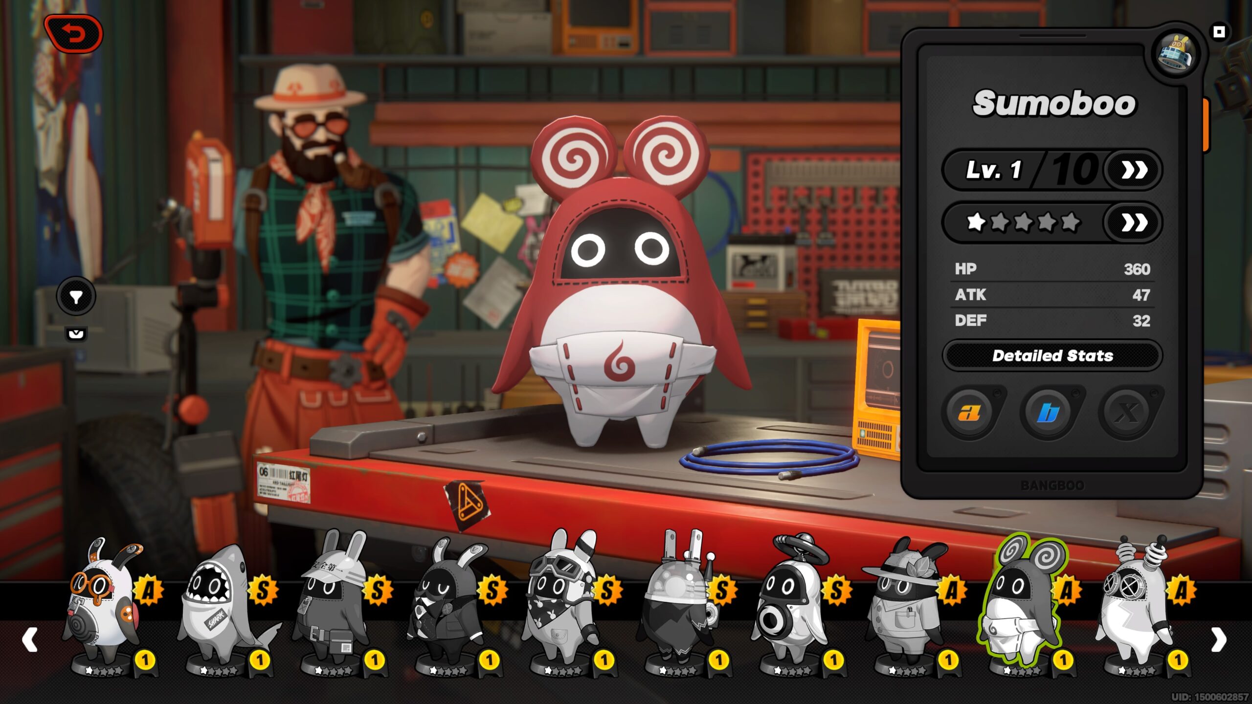 a little creature wears a red outfit standing on a workbench