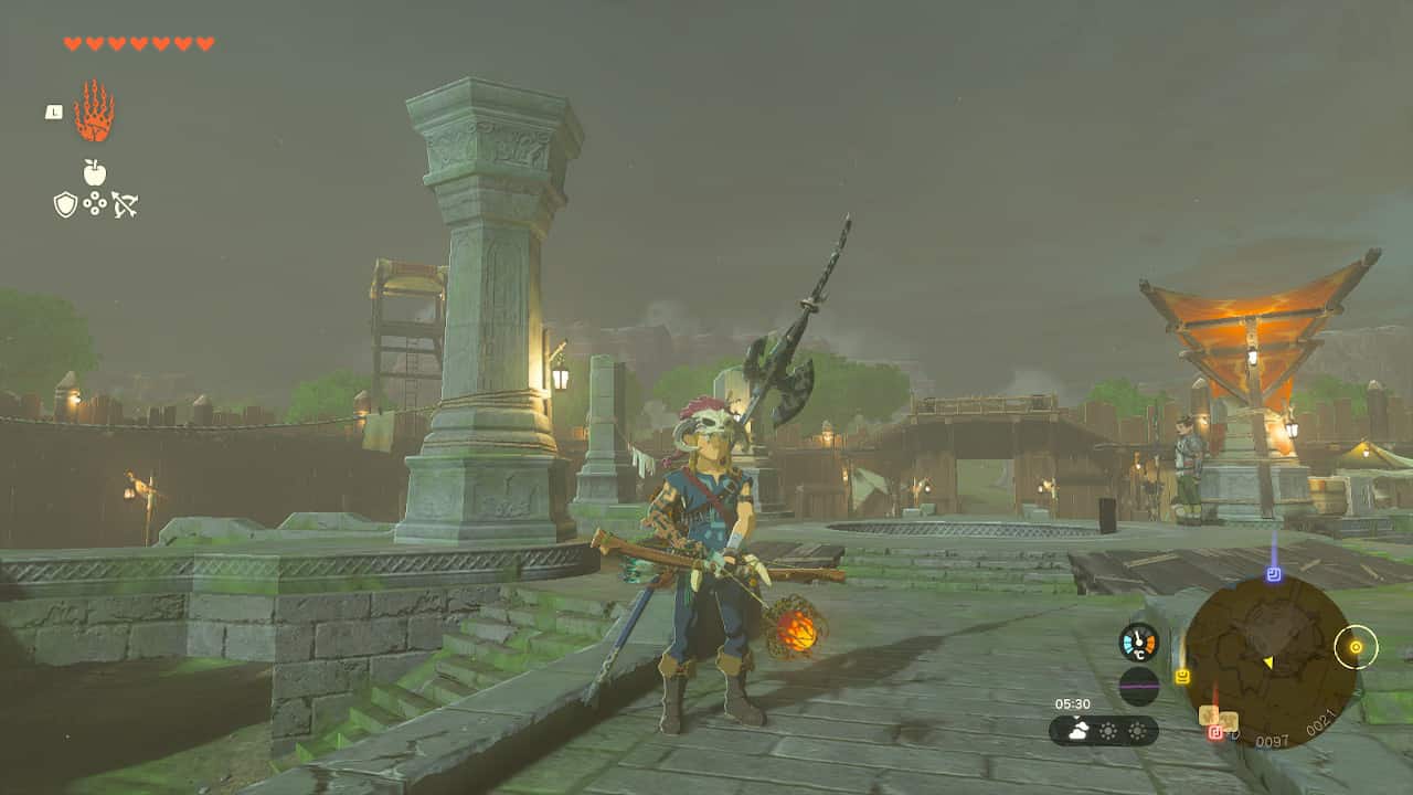 Tears of the Kingdom elemental arrow crafting guide - freezing, homing, fire, and shock: Link holding bow with fire arrow equipped.