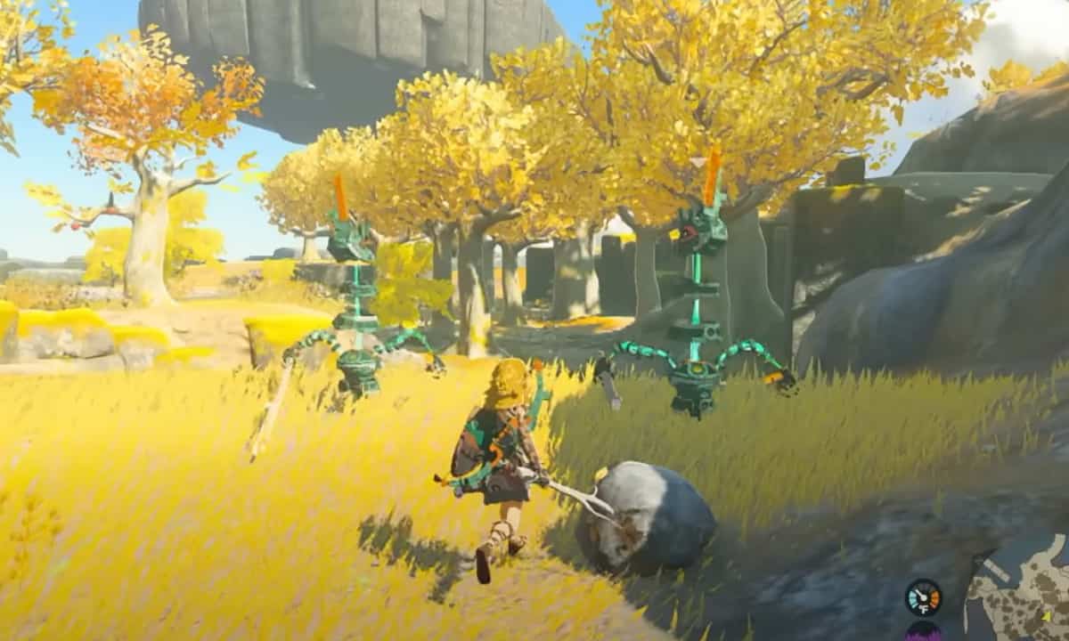 How to make a Tears of the Kingdom hammer: Link holding a fused hammer.