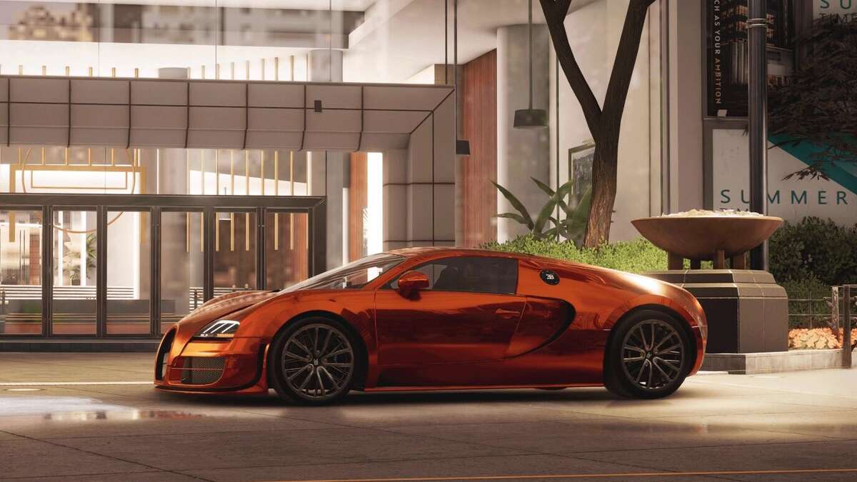 Test Drive Unlimited Solar Crown best starter car: An orange car outside a building at night.