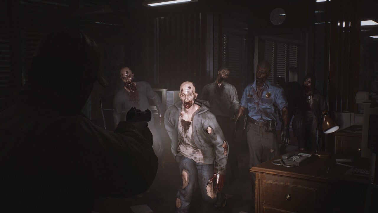 The Day Before ripped to shreds: The player aiming a pistol at a group of zombies walking towards them.