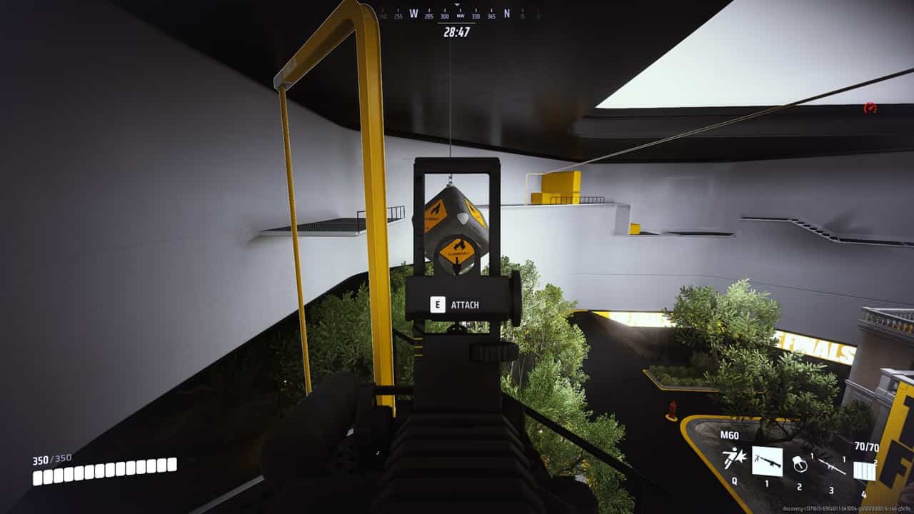 A player aims at an explosive crate in The Finals.