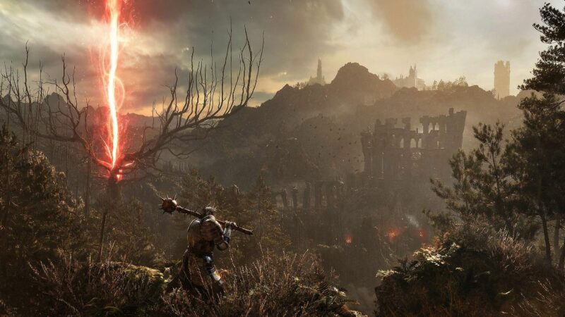 Lords of the Fallen - how to parry and block: Character stands and looks over a town.