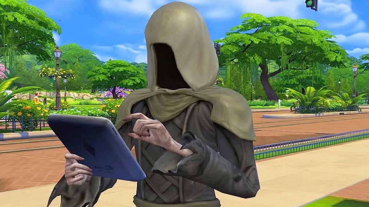 Grim using a tablet while standing outside.