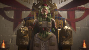 Total War Pharaoh how to start a campaign and campaign settings explained: A Pharaoh sits on his throne.
