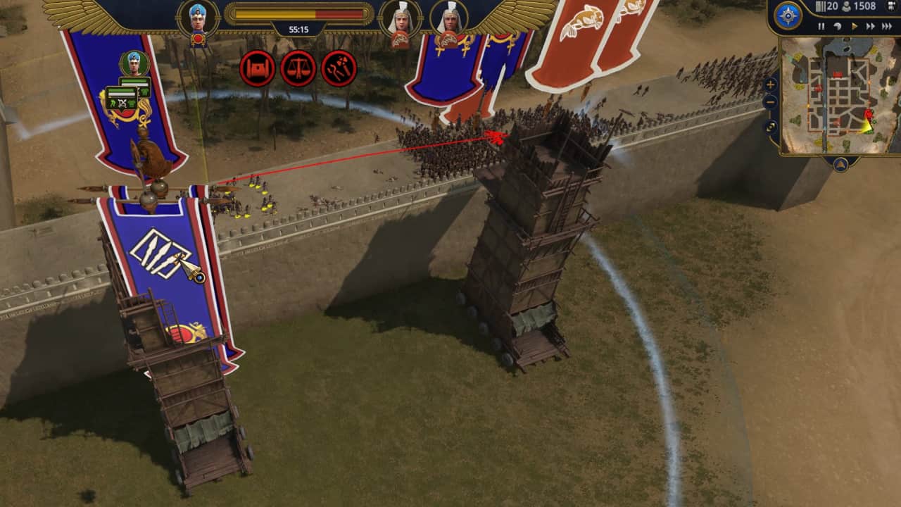 Total War Pharaoh how to win battles and control units: Units storm a large settlement wall.