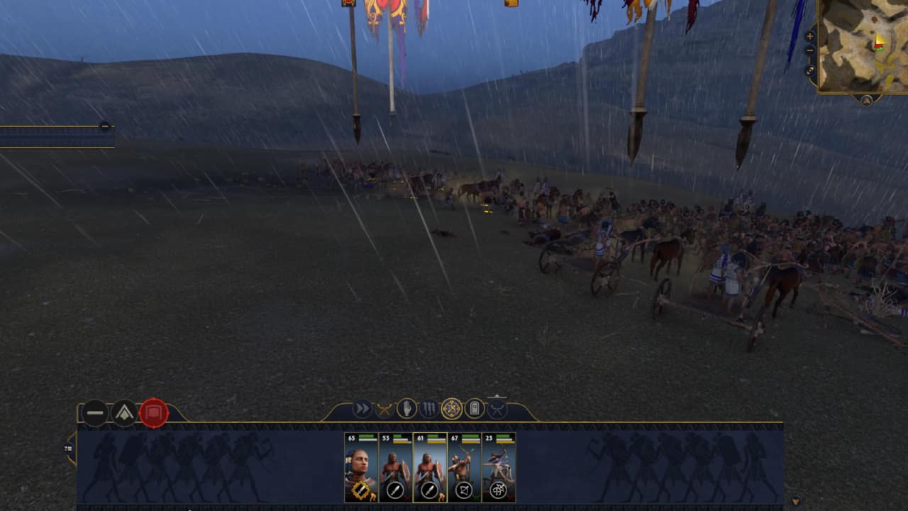Total War Pharaoh tips and tricks to help you beat the game: A battle takes place in the rain.