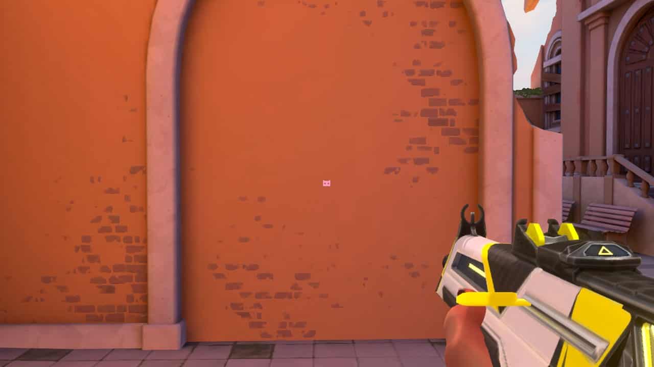 Valorant crosshair codes: An image of a Pink Cat crosshair. Image captured by VideoGamer.