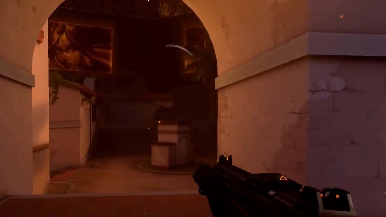 Valorant Champion 2023 skin glitch - A player stands in a dark version of the Sunset map. Image via Reddit.
