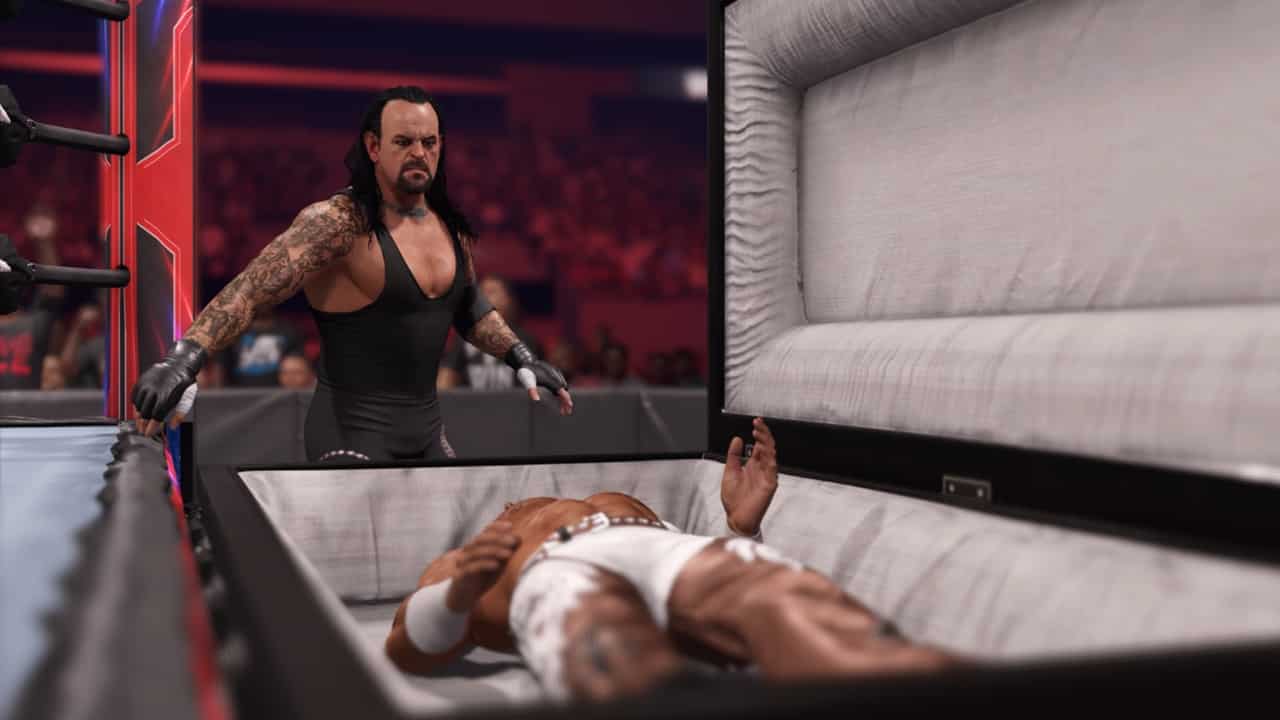 A wrestler is lying in a coffin in WWE 2K24. Image from 2K Games.