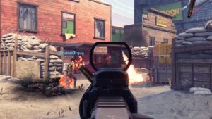 a player aiming at opponents in a war-torn urban environment. Fire and sandbags are present.