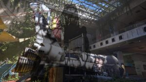 Image of a run-down building on a map in XDefiant, with a player's silhouette in the foreground.